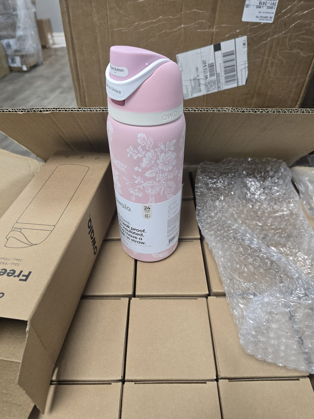 32-ounce Owala girls' pink ribbon portable water bottle - Free shipping